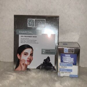 Facial care bundle. Charcoal spa treatment mask and retinol skin cream